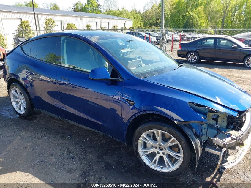 2023 Tesla Model Y Awd/Long Range Dual Motor All-Wheel Drive VIN: 7SAYGAEE2PF667255 Lot: 39250510