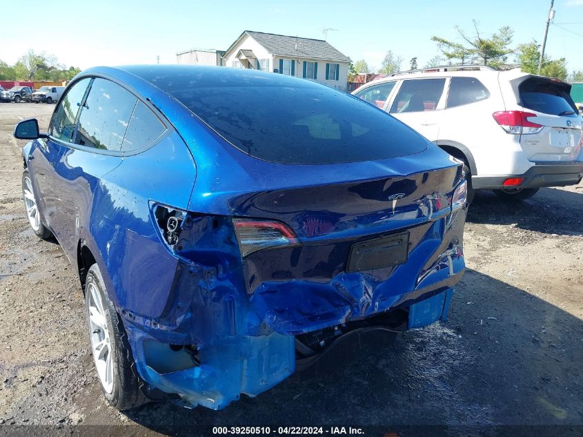 2023 Tesla Model Y Awd/Long Range Dual Motor All-Wheel Drive VIN: 7SAYGAEE2PF667255 Lot: 39250510