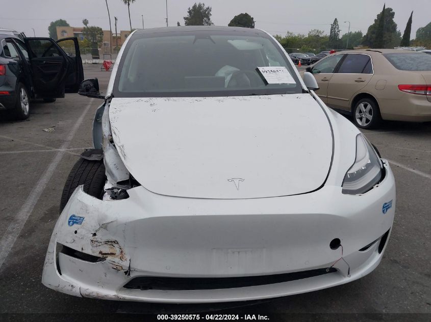 2021 Tesla Model Y Long Range Dual Motor All-Wheel Drive VIN: 5YJYGAEE4MF243827 Lot: 39250575