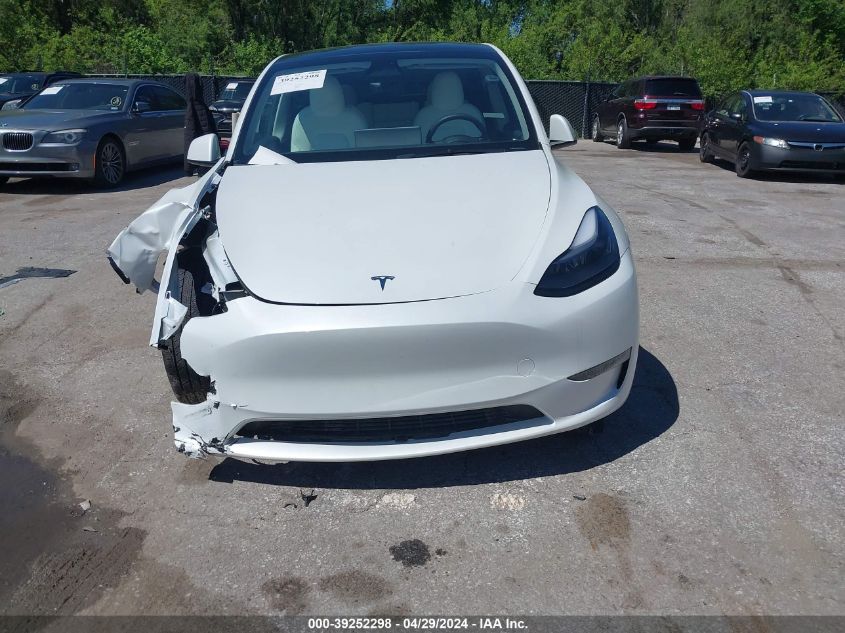 2023 Tesla Model Y Awd/Long Range Dual Motor All-Wheel Drive VIN: 7SAYGAEE2PF642162 Lot: 39252298