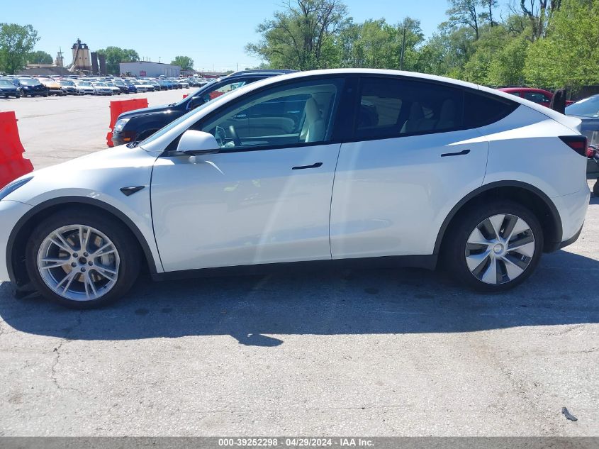 2023 Tesla Model Y Awd/Long Range Dual Motor All-Wheel Drive VIN: 7SAYGAEE2PF642162 Lot: 39252298