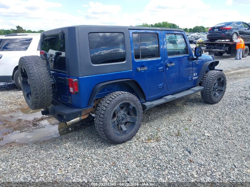 2009 Jeep Wrangler Unlimited X VIN: 1J8GA39119L727466 Lot: 39252340