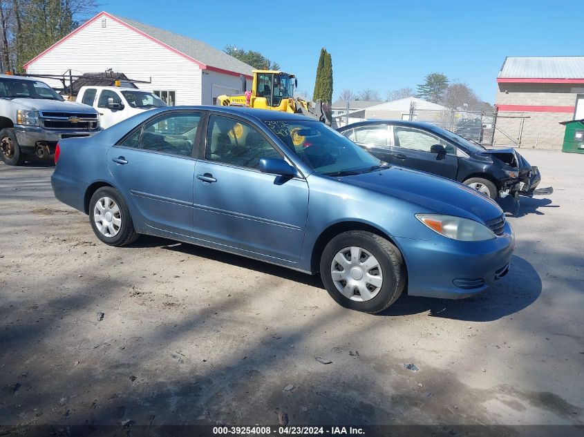 2002 Toyota Camry Le VIN: JTDBE32K520075953 Lot: 39254008