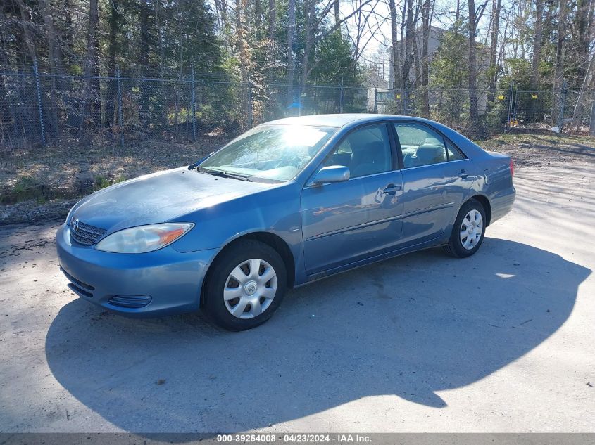 2002 Toyota Camry Le VIN: JTDBE32K520075953 Lot: 39254008