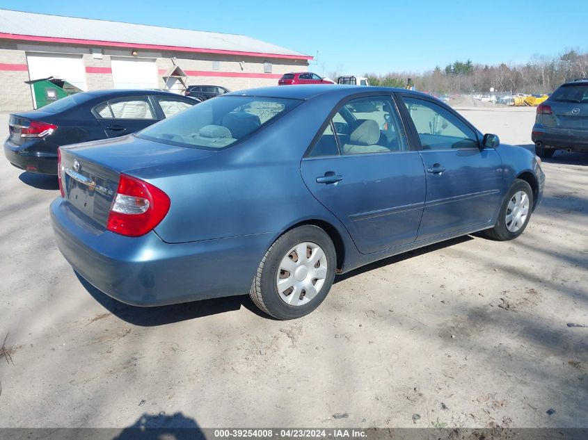 2002 Toyota Camry Le VIN: JTDBE32K520075953 Lot: 39254008