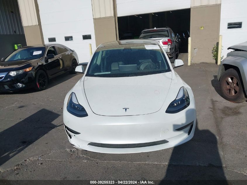 2021 Tesla Model 3 Standard Range Plus Rear-Wheel Drive VIN: 5YJ3E1EA7MF929664 Lot: 39255323