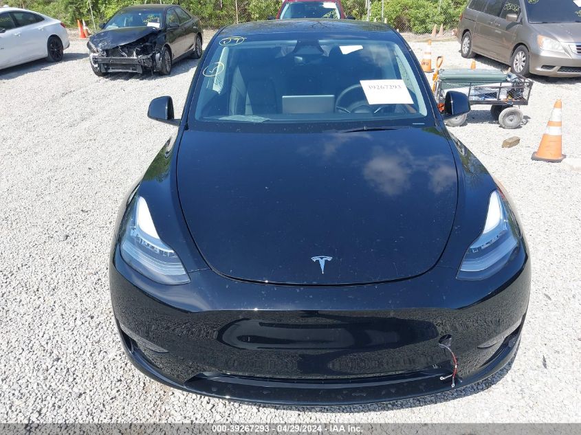 2023 Tesla Model Y Awd/Long Range Dual Motor All-Wheel Drive VIN: 7SAYGDEE4PA153681 Lot: 39267293