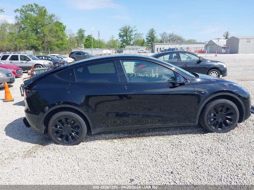 2023 Tesla Model Y Awd/Long Range Dual Motor All-Wheel Drive VIN: 7SAYGDEE4PA153681 Lot: 39267293