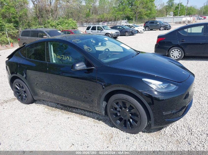 2023 Tesla Model Y Awd/Long Range Dual Motor All-Wheel Drive VIN: 7SAYGDEE4PA153681 Lot: 39267293