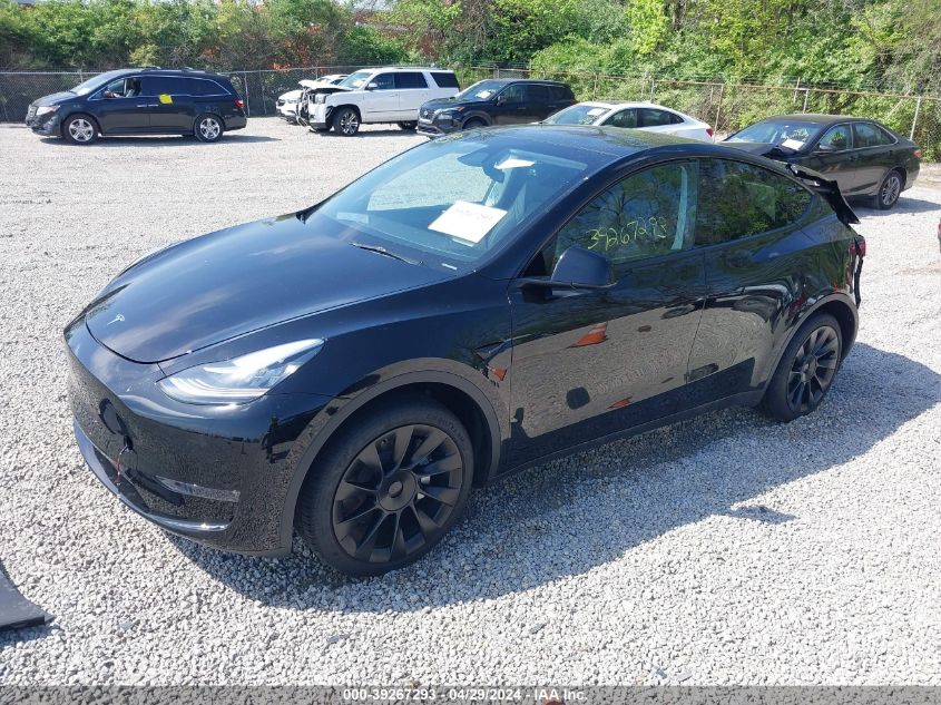 2023 Tesla Model Y Awd/Long Range Dual Motor All-Wheel Drive VIN: 7SAYGDEE4PA153681 Lot: 39267293