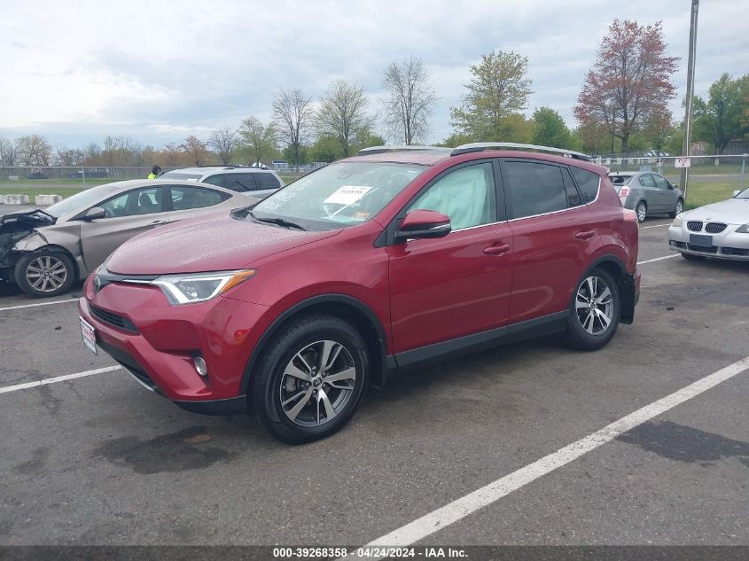 2018 Toyota Rav4 Xle VIN: 2T3RFREV0JW713864 Lot: 39268358