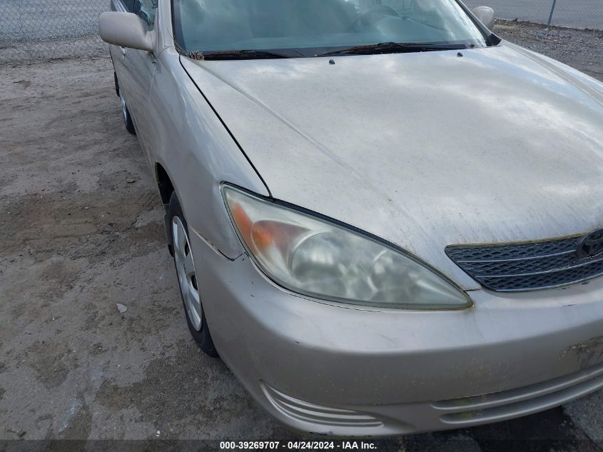 2003 Toyota Camry Le VIN: 4T1BE32K13U673477 Lot: 40473806