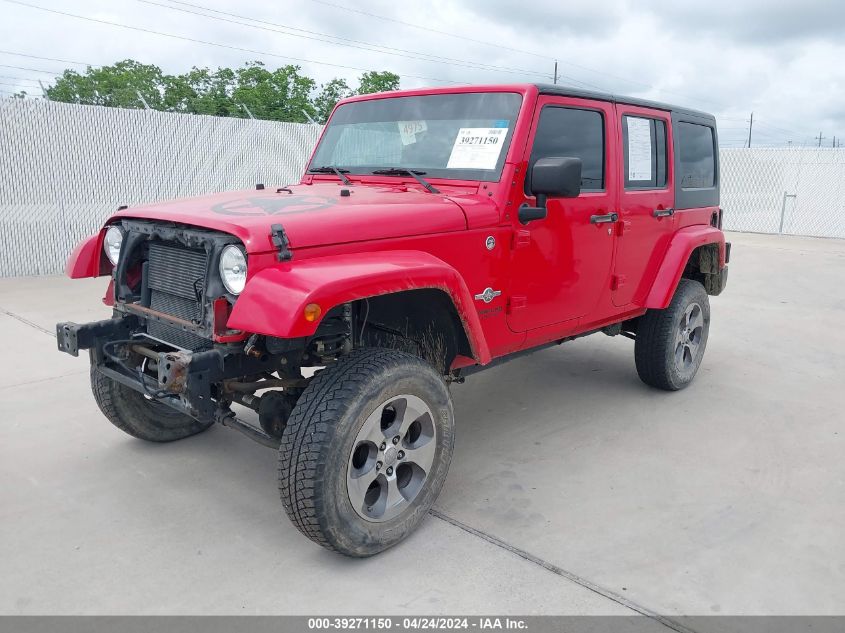 2015 Jeep Wrangler Unlimited Freedom Edition VIN: 1C4BJWDG6FL598912 Lot: 39271150