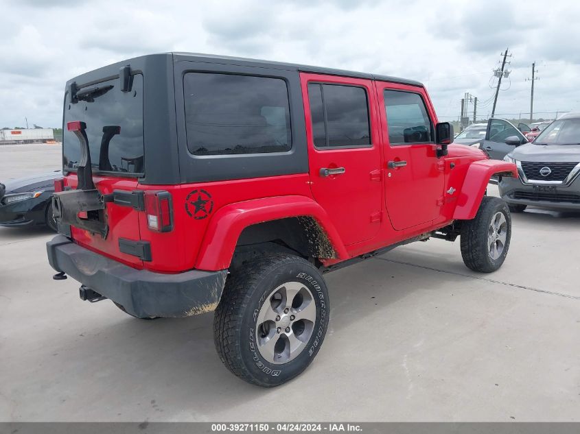 2015 Jeep Wrangler Unlimited Freedom Edition VIN: 1C4BJWDG6FL598912 Lot: 39271150