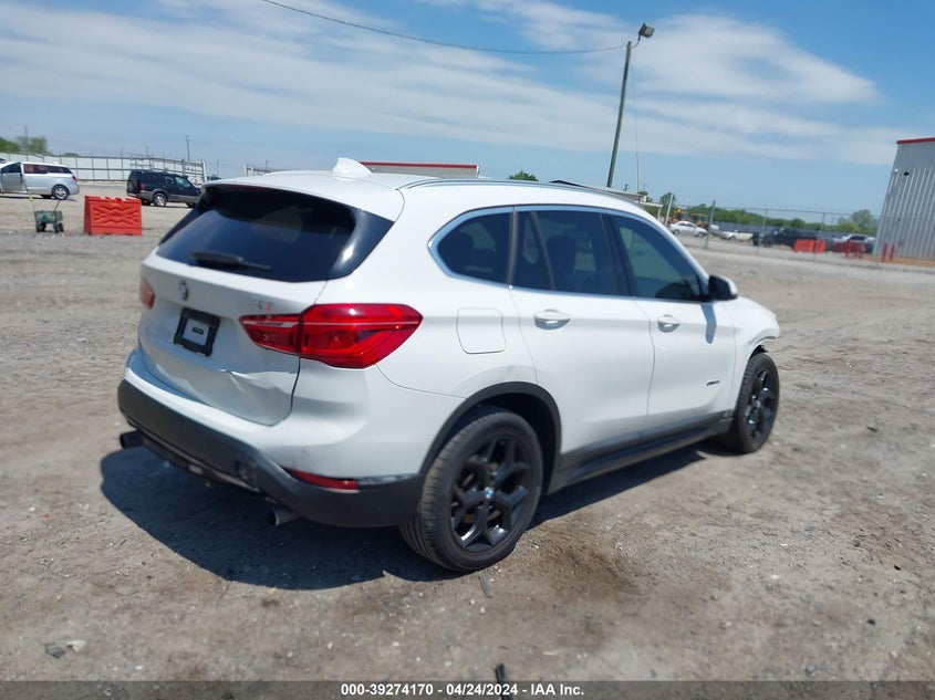 2018 BMW X1 Sdrive28I VIN: WBXHU7C33J5H40741 Lot: 39274170