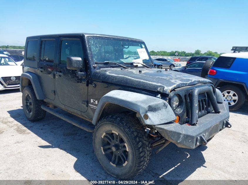 2007 Jeep Wrangler Unlimited X VIN: 1J4GA39177L115223 Lot: 39277418