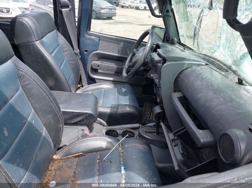 2007 Jeep Wrangler Unlimited Sahara VIN: 1J4GA59147L166321 Lot: 39280869