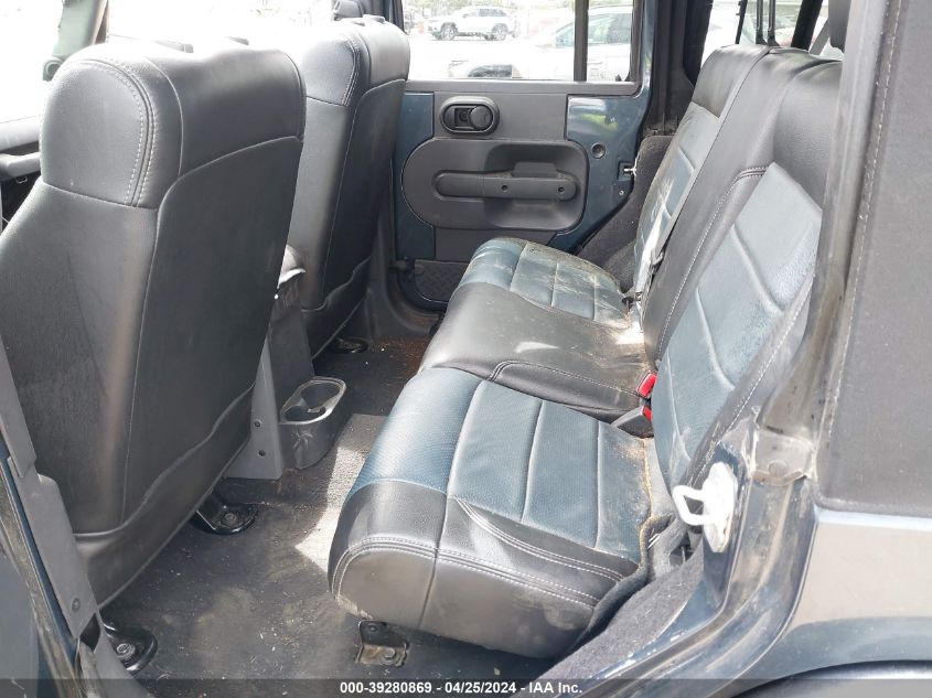 2007 Jeep Wrangler Unlimited Sahara VIN: 1J4GA59147L166321 Lot: 39280869