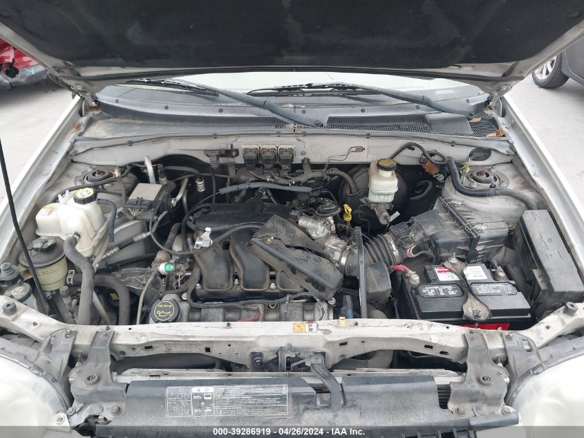 2005 Ford Escape Limited VIN: 1FMYU04165KB20063 Lot: 39286919