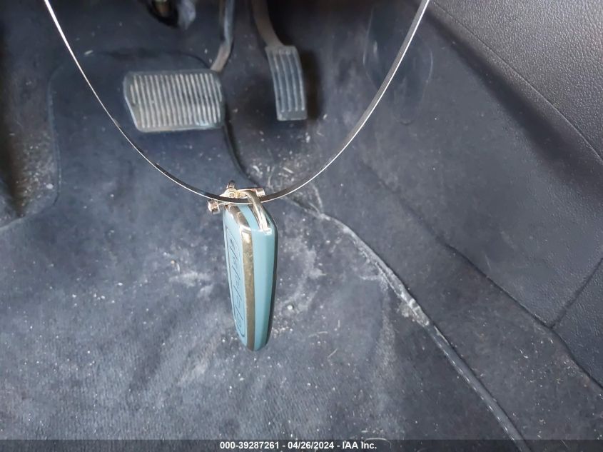 2015 Ford Focus Titanium VIN: 1FADP3J21FL322786 Lot: 39287261