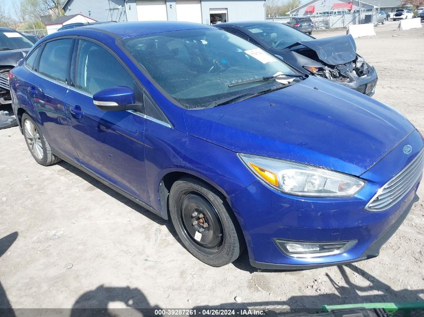 2015 Ford Focus Titanium VIN: 1FADP3J21FL322786 Lot: 39287261