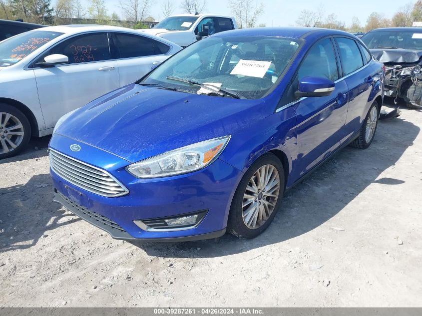 2015 Ford Focus Titanium VIN: 1FADP3J21FL322786 Lot: 39287261