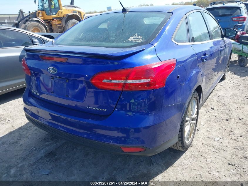 2015 Ford Focus Titanium VIN: 1FADP3J21FL322786 Lot: 39287261