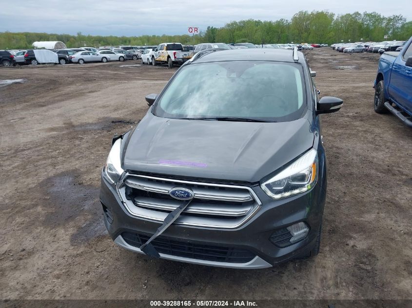 2017 Ford Escape Titanium VIN: 1FMCU0J97HUD38882 Lot: 39288165