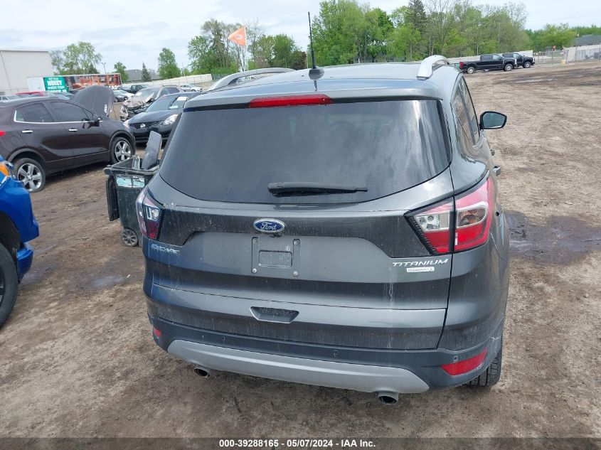 2017 Ford Escape Titanium VIN: 1FMCU0J97HUD38882 Lot: 39288165