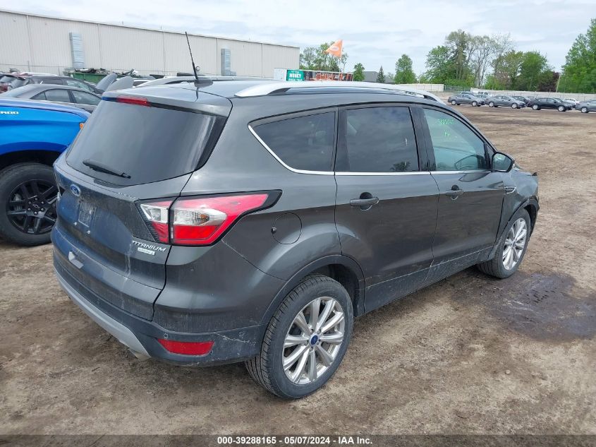 2017 Ford Escape Titanium VIN: 1FMCU0J97HUD38882 Lot: 39288165