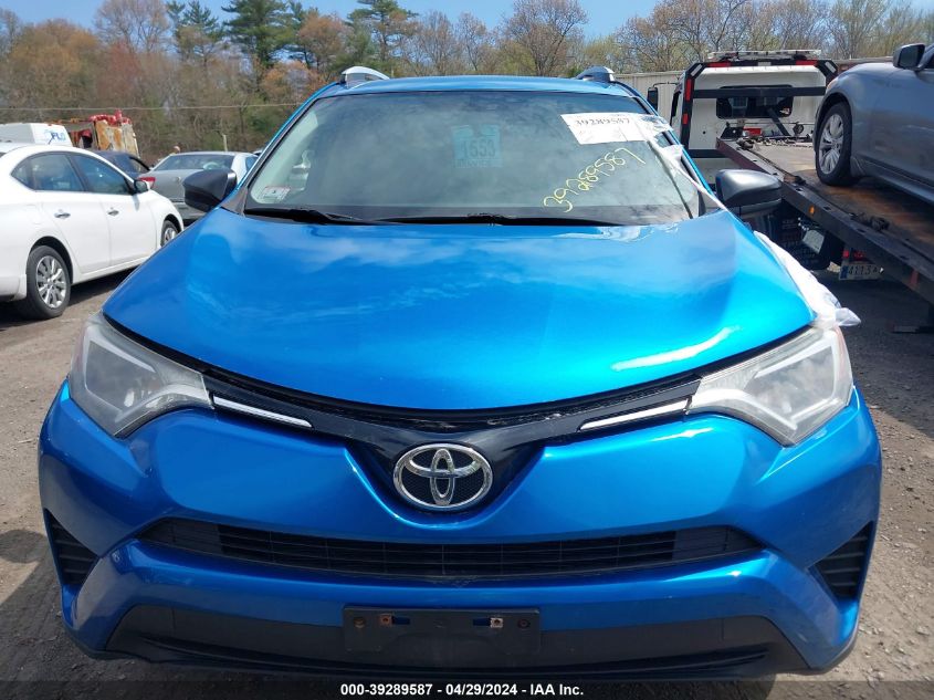 2016 Toyota Rav4 Le VIN: JTMBFREV0GJ055729 Lot: 39289587