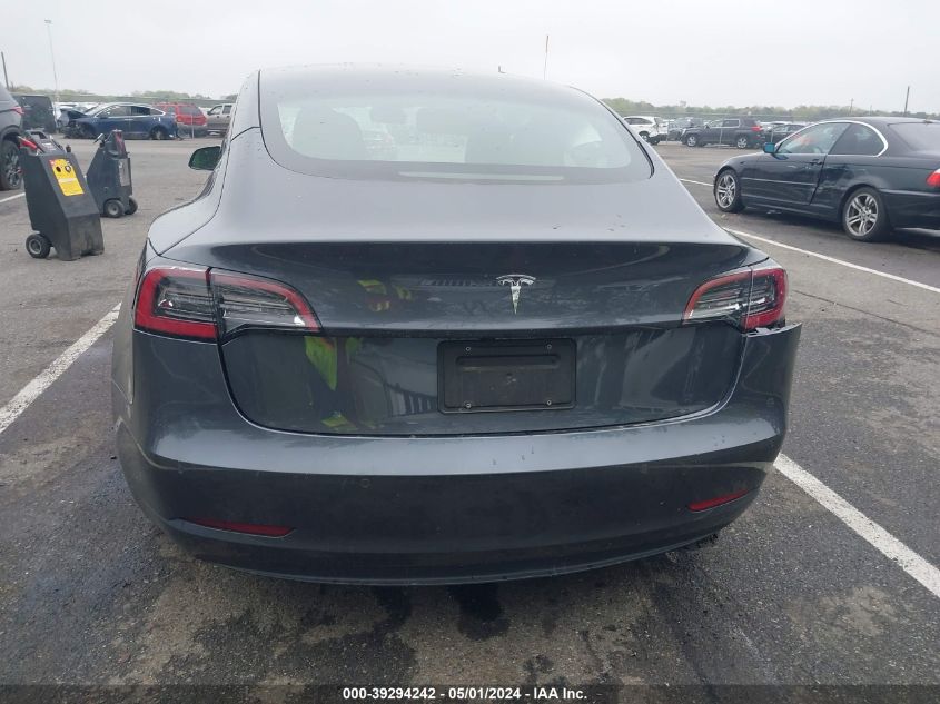 2021 Tesla Model 3 Standard Range Plus Rear-Wheel Drive VIN: 5YJ3E1EA5MF047005 Lot: 39294242