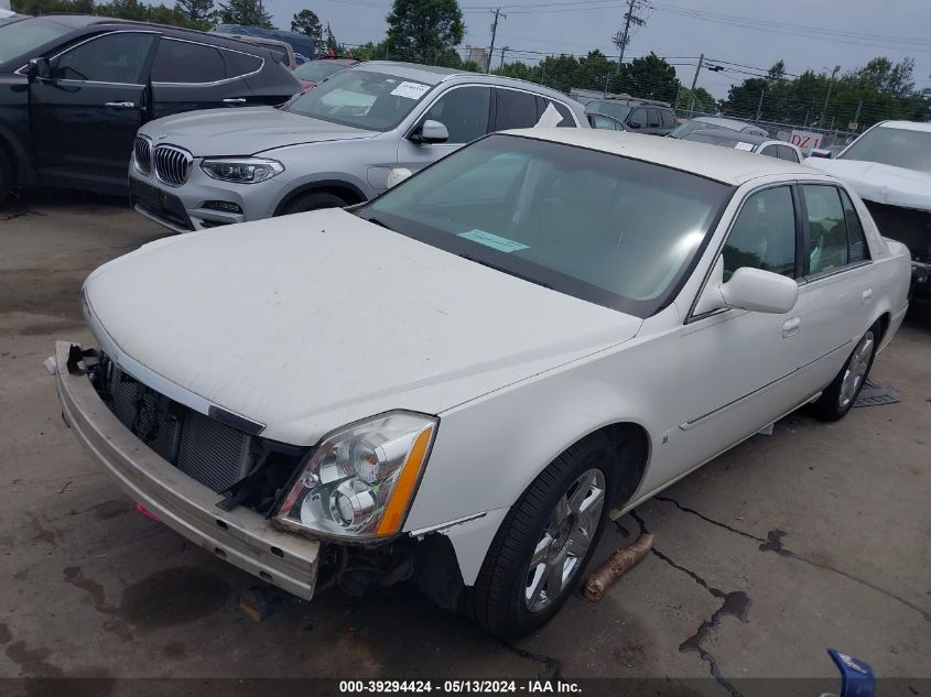 2007 Cadillac Dts V8 VIN: 1G6KD57Y77U228072 Lot: 39294424