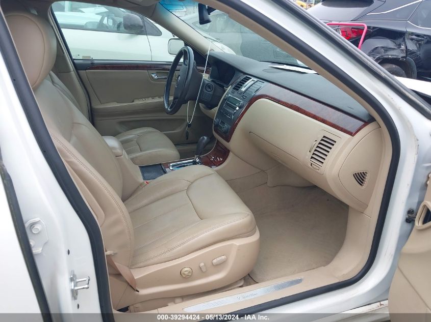 2007 Cadillac Dts V8 VIN: 1G6KD57Y77U228072 Lot: 39294424