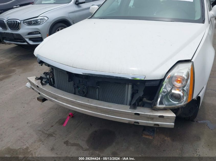 2007 Cadillac Dts V8 VIN: 1G6KD57Y77U228072 Lot: 39294424