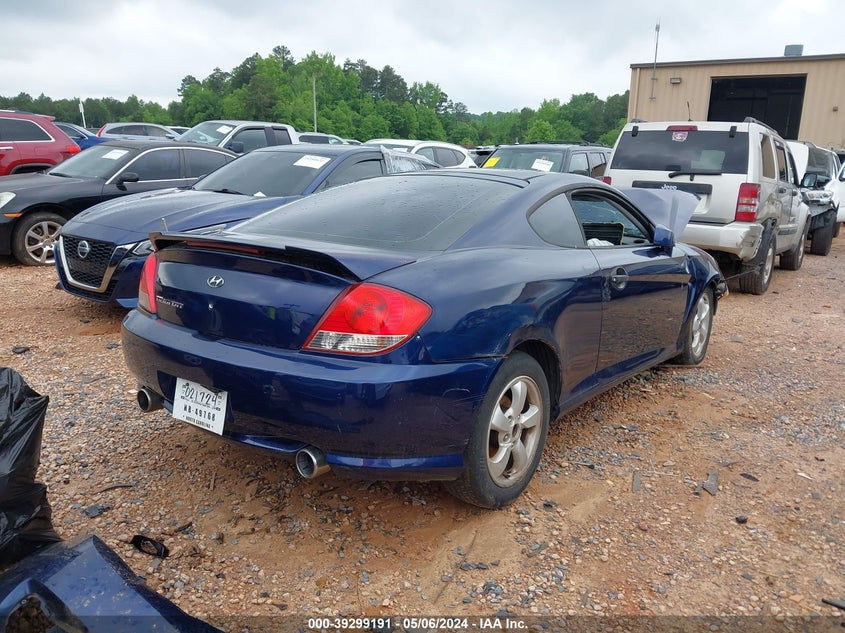 2006 Hyundai Tiburon Gs VIN: KMHHM65D66U230421 Lot: 39299191