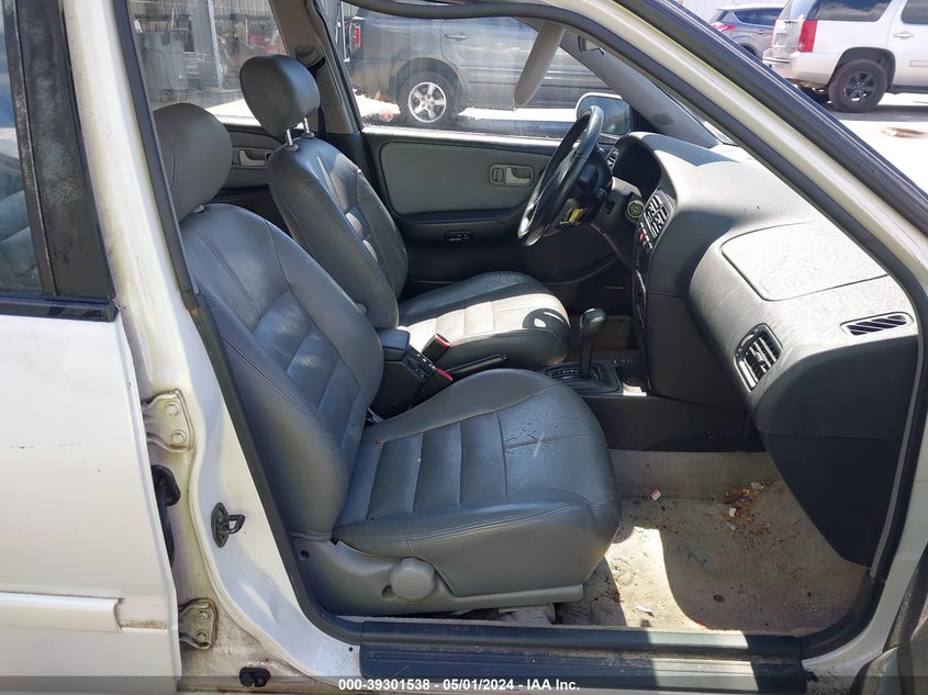 1995 Infiniti G20 VIN: JNKCP01D9ST525875 Lot: 39301538