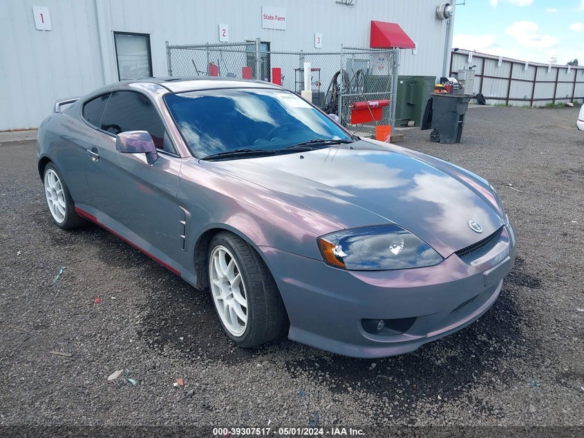 VIN: KMHHN65F66U229042 | HYUNDAI TIBURON 2006 car history - Stat.vin