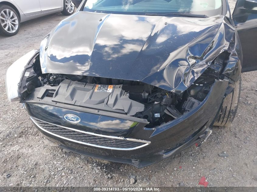 2017 Ford Focus Se VIN: 1FADP3F24HL308022 Lot: 39314783