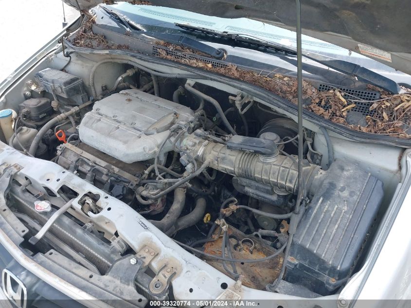 2002 Honda Odyssey Lx VIN: 2HKRL18542H566608 Lot: 39320774