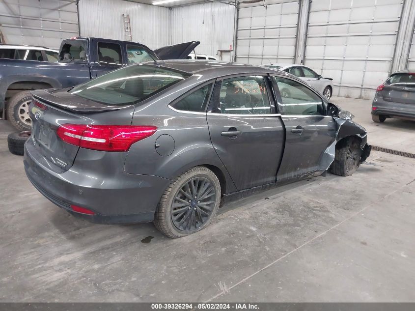 2015 Ford Focus Titanium VIN: 1FADP3J2XFL220709 Lot: 39326294