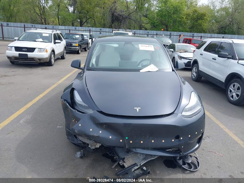 2023 Tesla Model Y Awd/Long Range Dual Motor All-Wheel Drive VIN: 7SAYGAEE5PF759296 Lot: 39326474