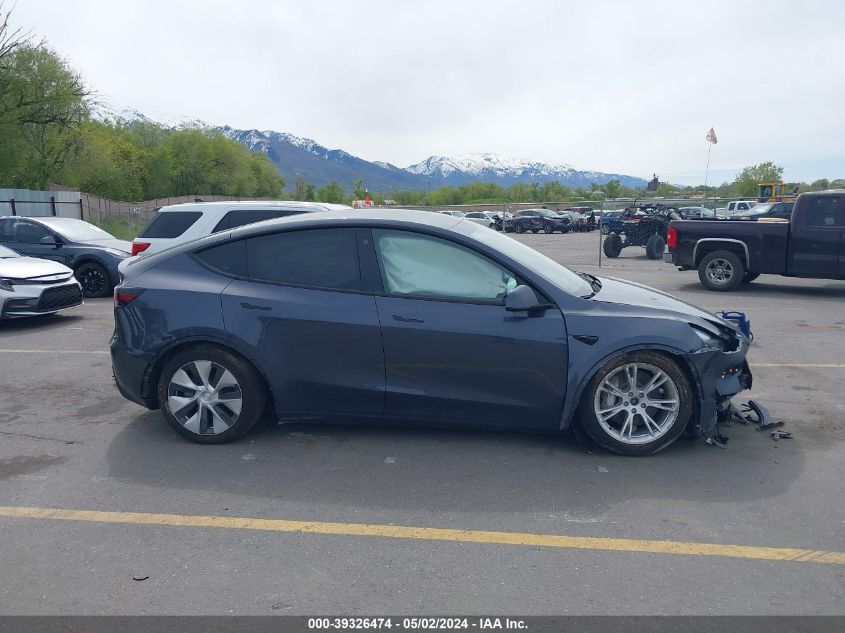 2023 Tesla Model Y Awd/Long Range Dual Motor All-Wheel Drive VIN: 7SAYGAEE5PF759296 Lot: 39326474