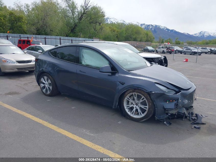 2023 Tesla Model Y Awd/Long Range Dual Motor All-Wheel Drive VIN: 7SAYGAEE5PF759296 Lot: 39326474