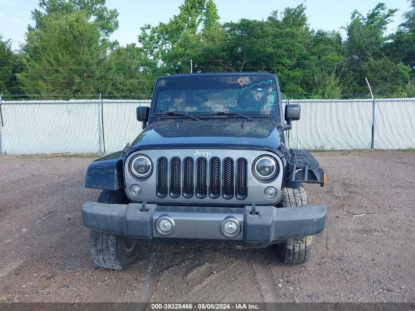 2014 Jeep Wrangler Unlimited Freedom Edition VIN: 1C4BJWDG9EL234689 Lot: 39328466