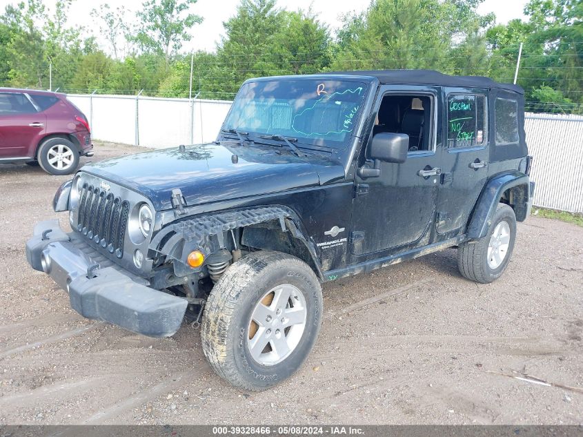 2014 Jeep Wrangler Unlimited Freedom Edition VIN: 1C4BJWDG9EL234689 Lot: 39328466