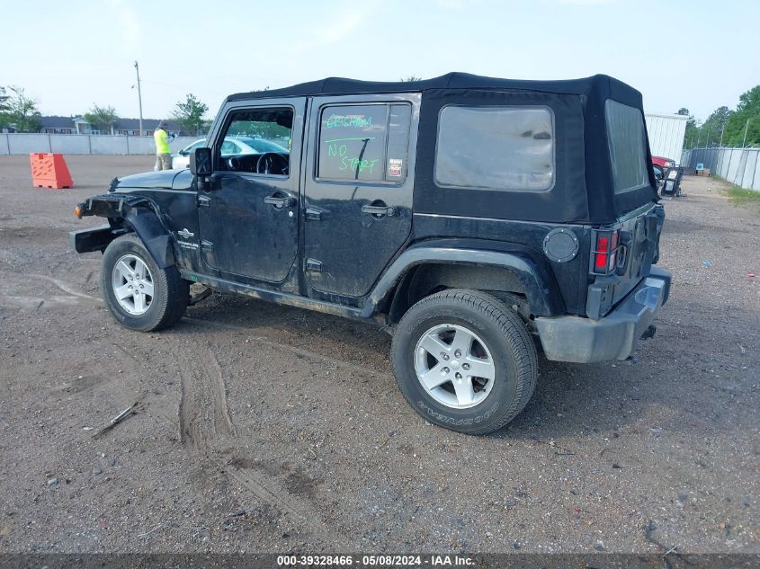 2014 Jeep Wrangler Unlimited Freedom Edition VIN: 1C4BJWDG9EL234689 Lot: 39328466