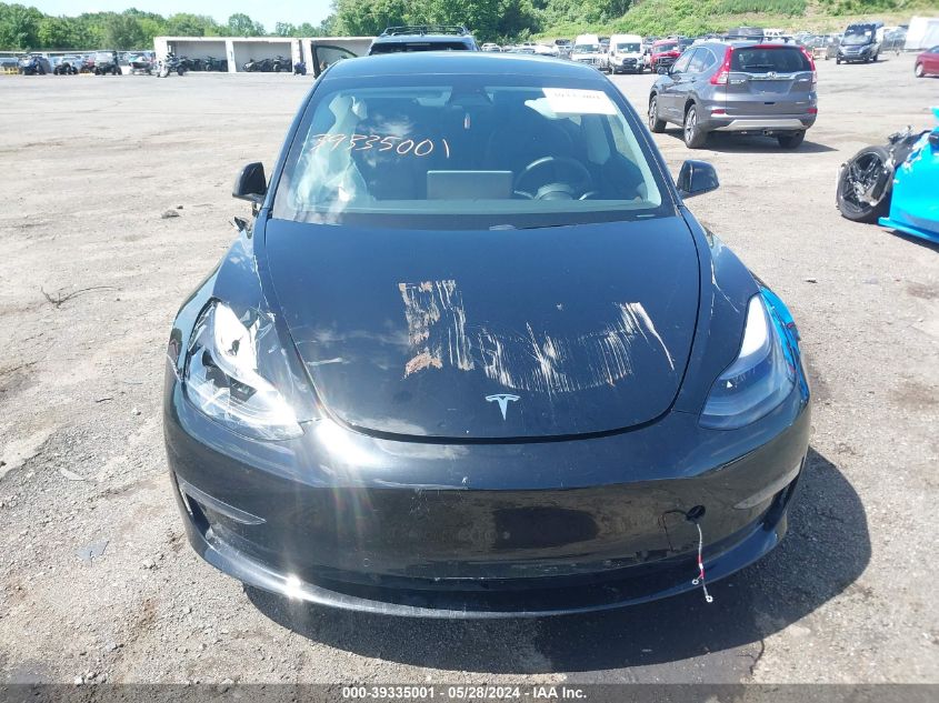 2021 Tesla Model 3 Standard Range Plus Rear-Wheel Drive VIN: 5YJ3E1EA2MF048807 Lot: 39335001