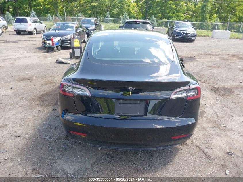 2021 Tesla Model 3 Standard Range Plus Rear-Wheel Drive VIN: 5YJ3E1EA2MF048807 Lot: 39335001