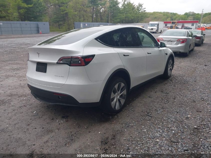 2024 Tesla Model Y Long Range Dual Motor All-Wheel Drive VIN: 7SAYGDEE0RA229822 Lot: 39335617